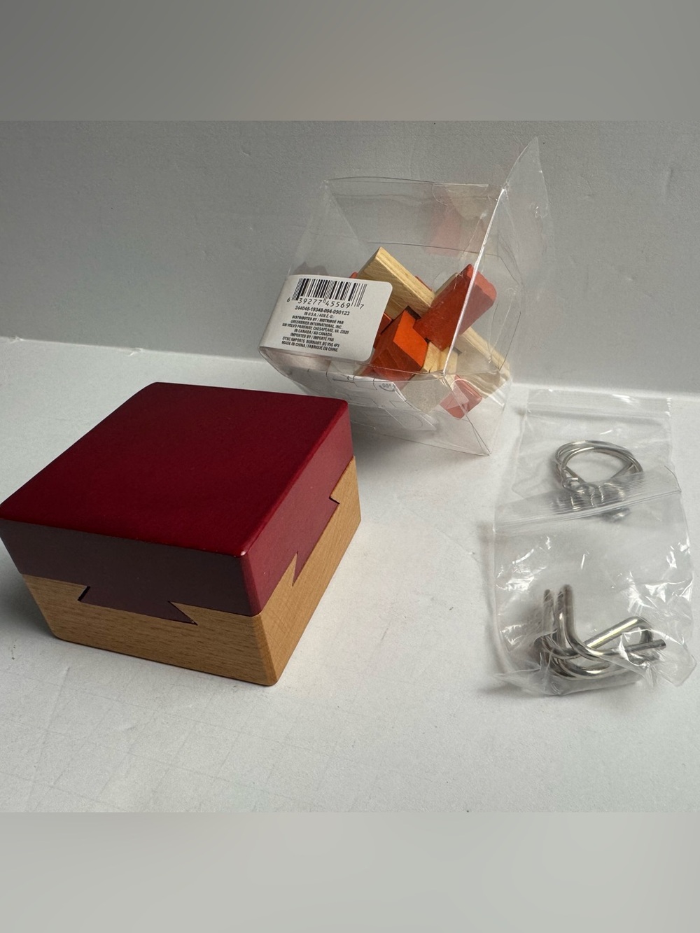 4 Pieces of Puzzles. Including Wooden Interlocking Puzzle Box - Fun Brain Teaser